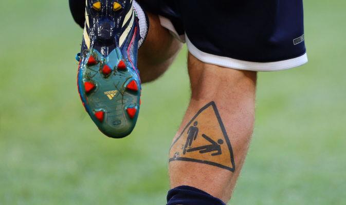 Tatuaggio Tattoo De Rossi Triangolo giallo