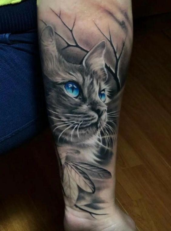 Tatuaggio Tattoo Gatto Realistico con Occhi Colorati