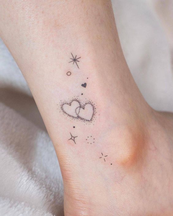 Tatuaggio Tattoo Caviglia Cuori e Stelle