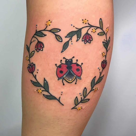 Tatuaggio Tattoo Coccinella Fiori cuore