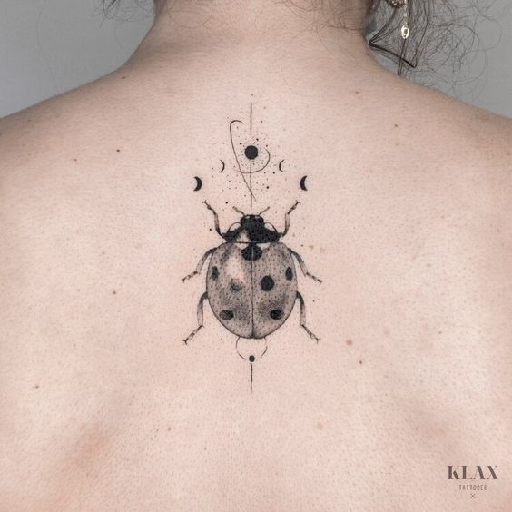 Tatuaggio Tattoo Coccinella Schiena