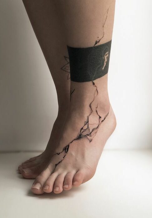 Tatuaggio Tattoo Uomo Caviglia e Piede