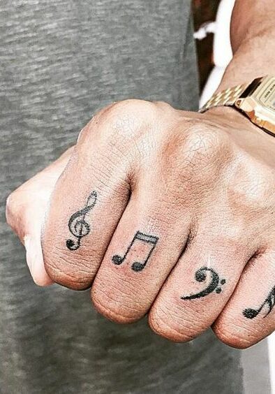 Tatuaggio Tattoo Musica Note sulle Dita