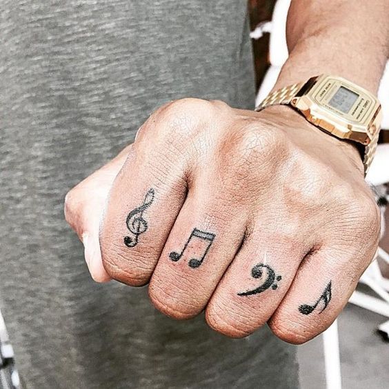 Tatuaggio Tattoo Musica Note sulle Dita