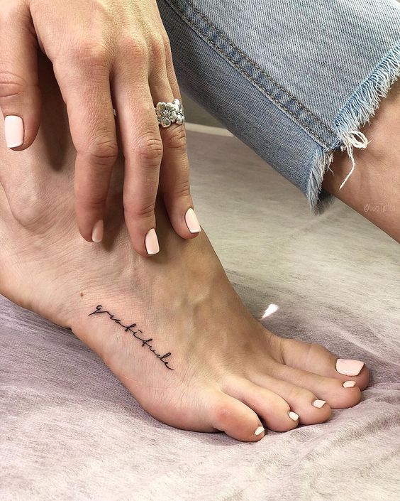 Tatuaggio Tattoo Piedi Scritta